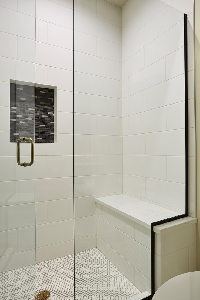 This is an example of a large country 3/4 bathroom in Minneapolis with recessed-panel cabinets, black cabinets, an alcove shower, a two-piece toilet, black and white tile, porcelain tile, grey walls, brick floors, an undermount sink, engineered quartz benchtops, white floor and a hinged shower door.