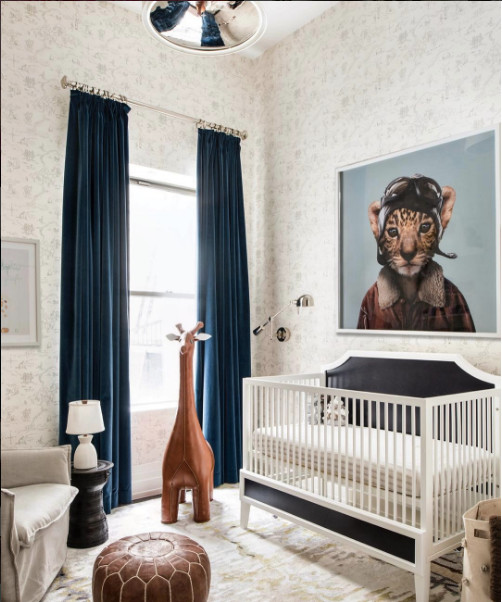 Design ideas for a contemporary gender-neutral nursery in New York with white walls and white floor.