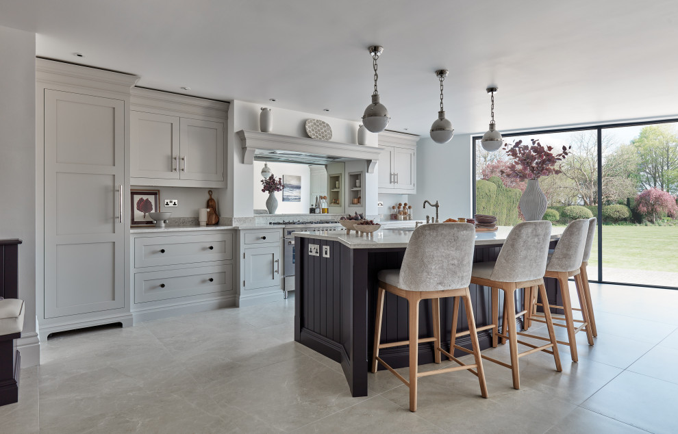 Inspiration for a medium sized contemporary l-shaped kitchen/diner in Manchester with shaker cabinets, purple cabinets, quartz worktops, white splashback, stainless steel appliances, an island, beige floors and white worktops.