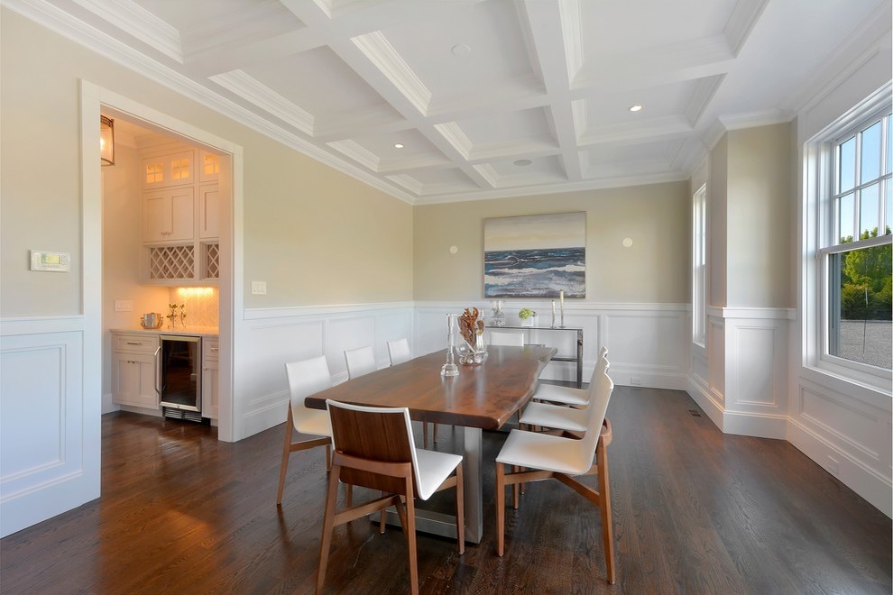 Design ideas for a large traditional separate dining room in New York with beige walls and dark hardwood floors.
