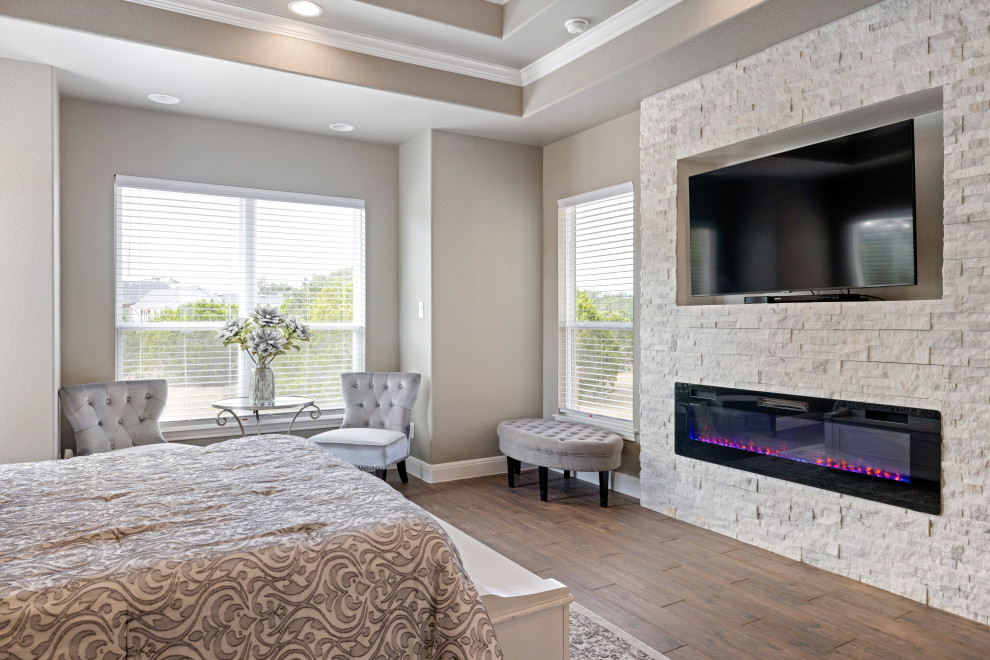 Transitional bedroom photo in Austin