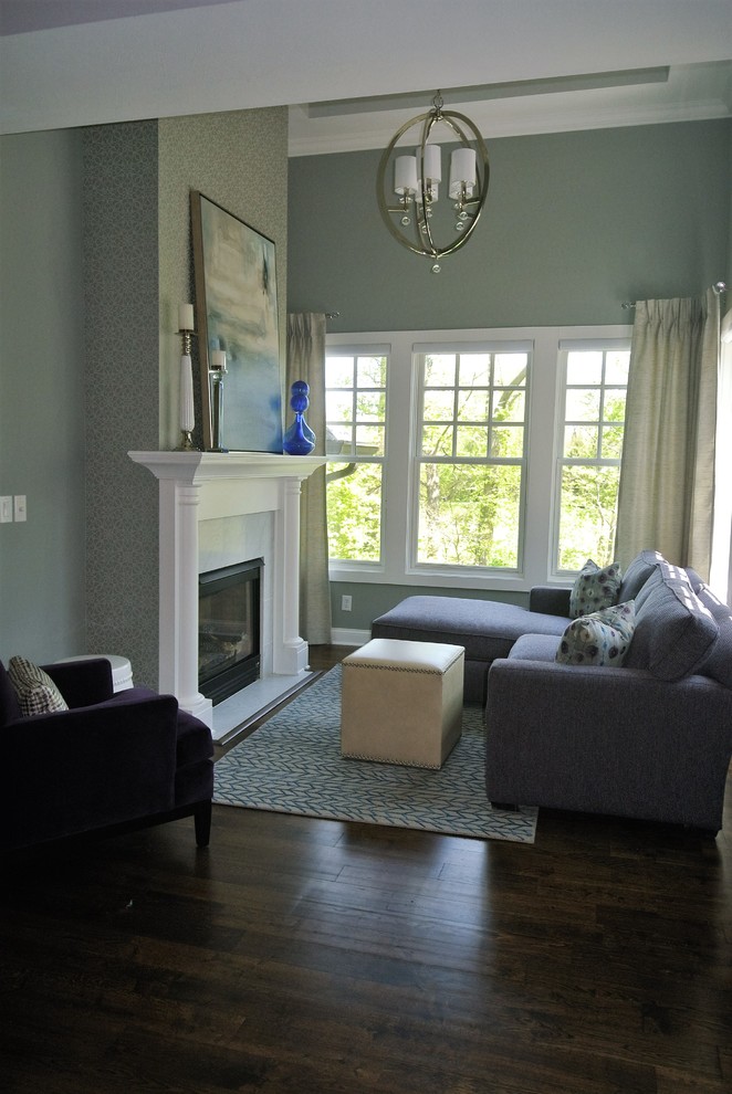 Large transitional master dark wood floor bedroom photo in Indianapolis with blue walls, a standard fireplace and a stone fireplace