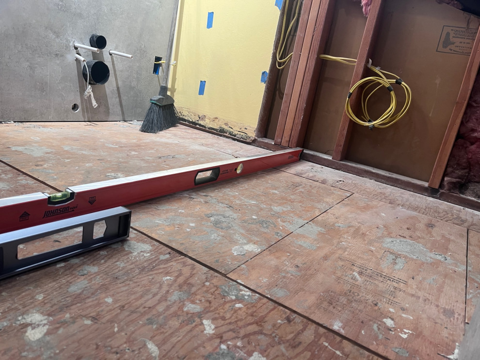 how to install a floating floor with a highpoint at one end