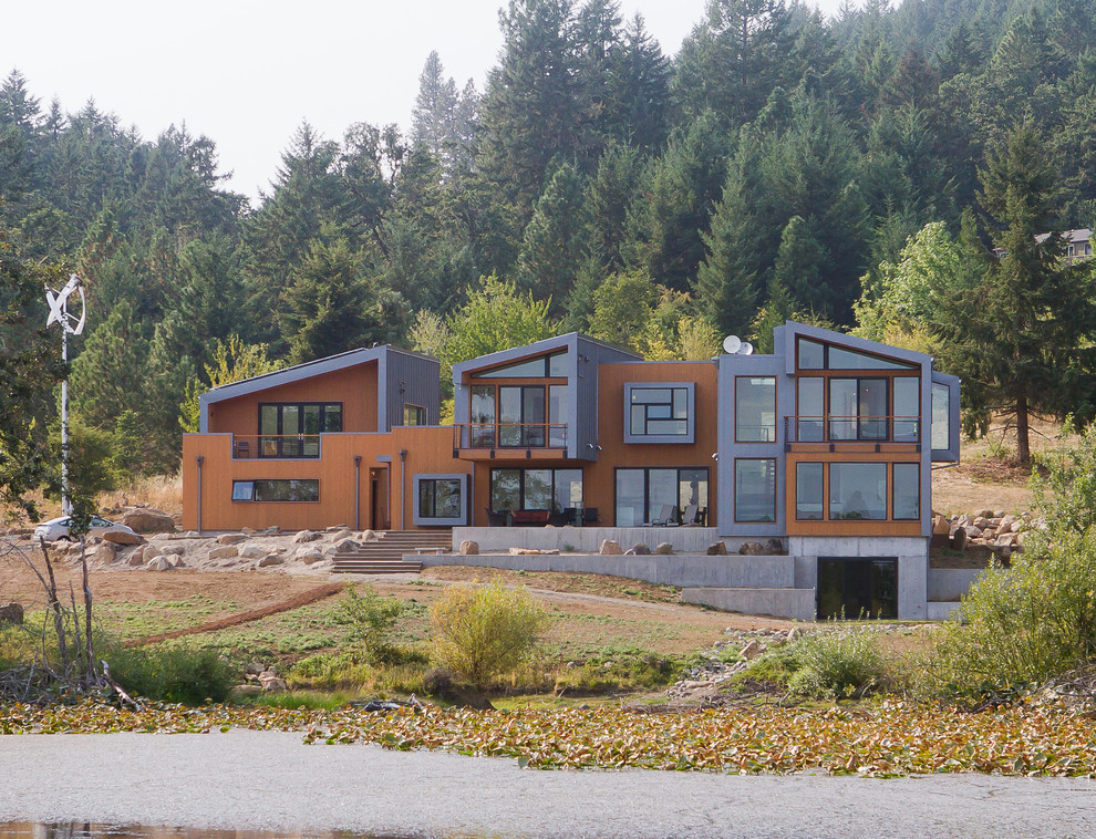 Design ideas for a contemporary exterior in Portland with metal siding.