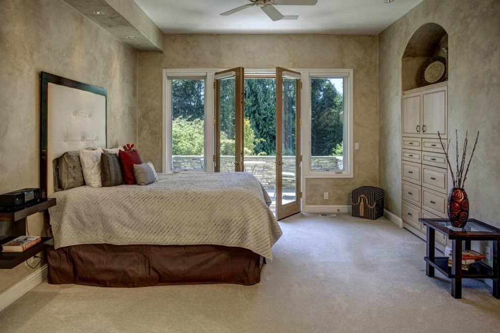 Design ideas for a traditional master bedroom in Seattle with beige walls, carpet and no fireplace.