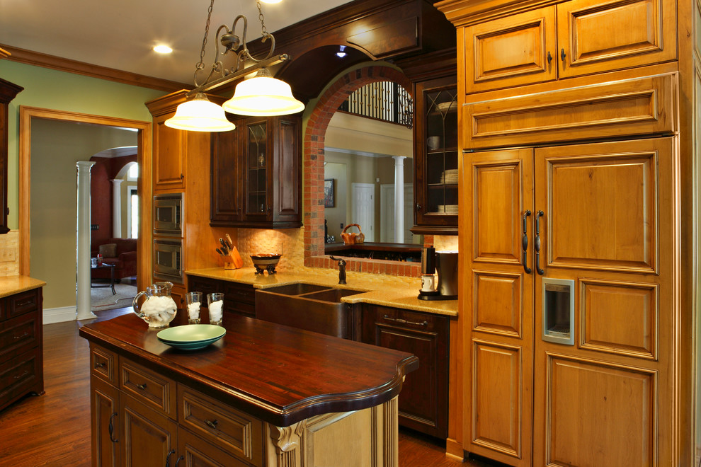This is an example of a transitional eat-in kitchen in Atlanta.