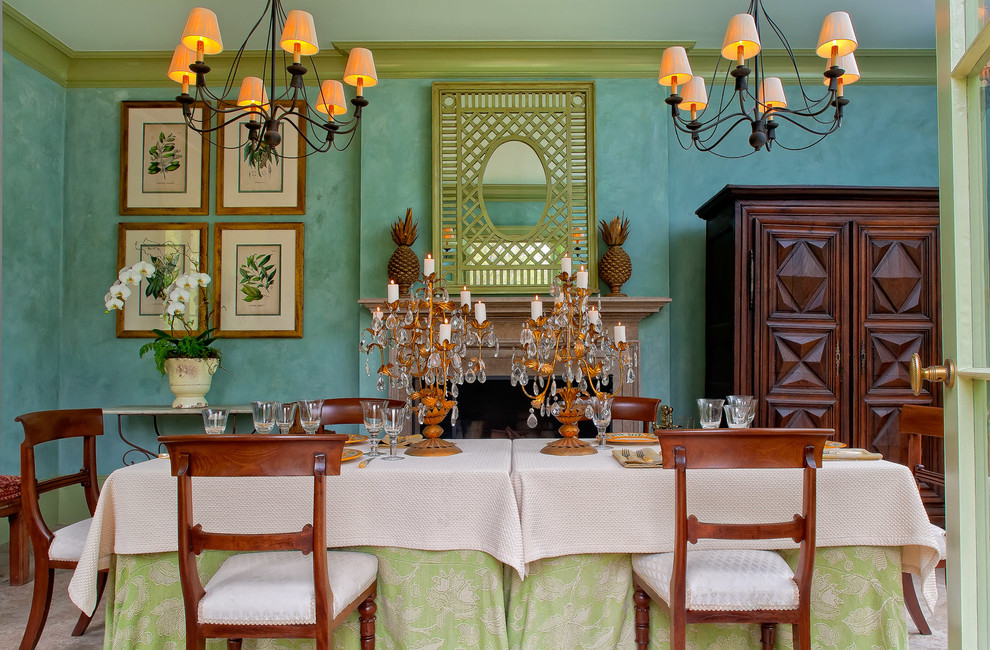 Photo of a tropical dining room in Richmond with blue walls.