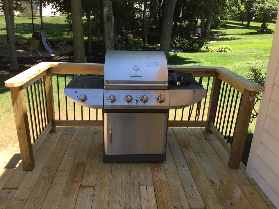 Inspiration for a huge backyard deck remodel in Indianapolis