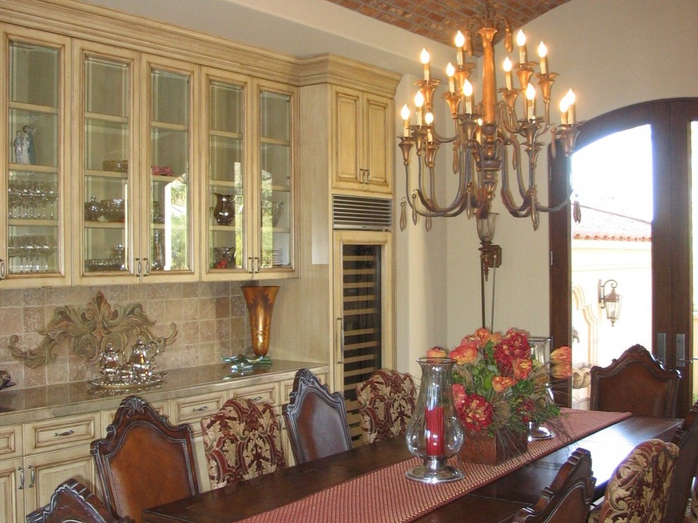Enclosed dining room - large marble floor enclosed dining room idea in Phoenix with beige walls