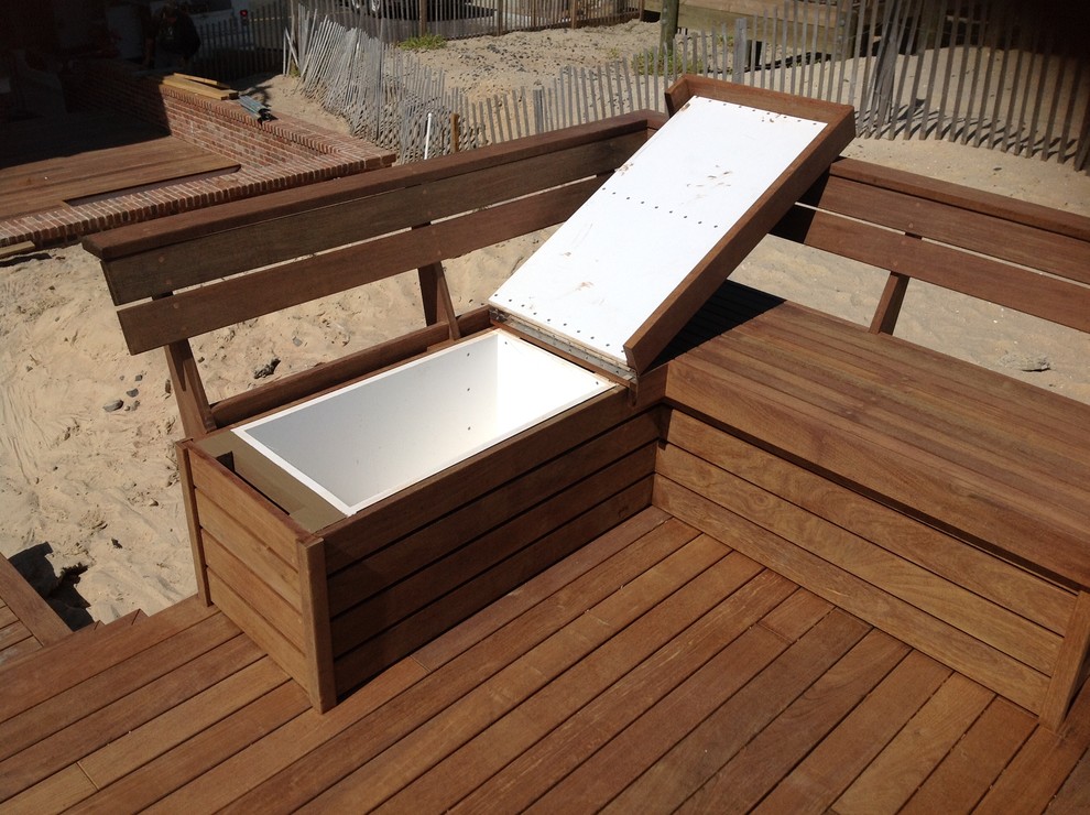This is an example of a beach style deck in New York with no cover.