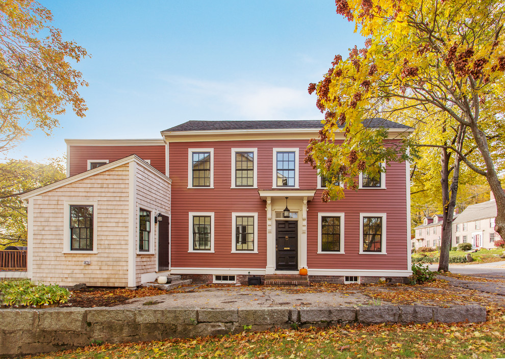Photo of a mid-sized traditional three-storey red exterior in Boston with wood siding and a gable roof.