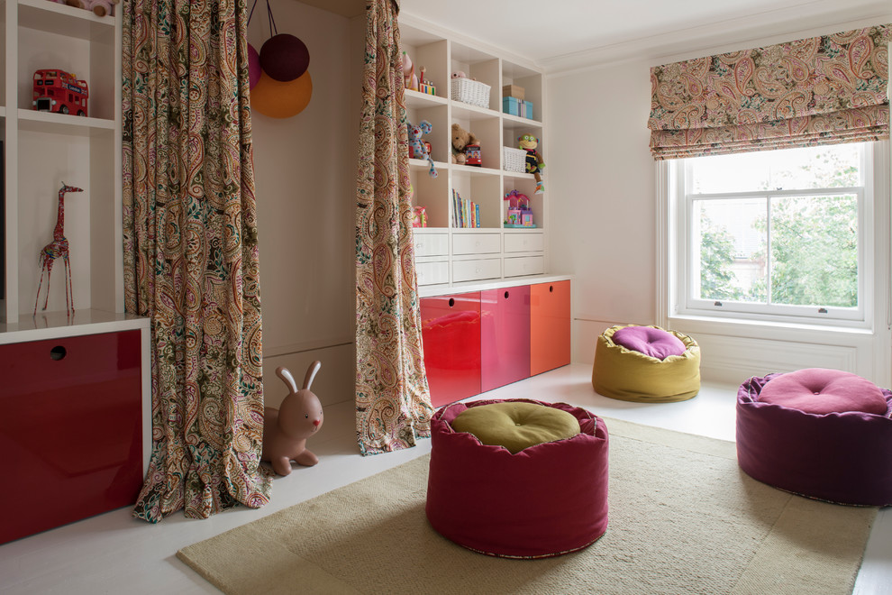 This is an example of a traditional kids' playroom for kids 4-10 years old in London with white walls.