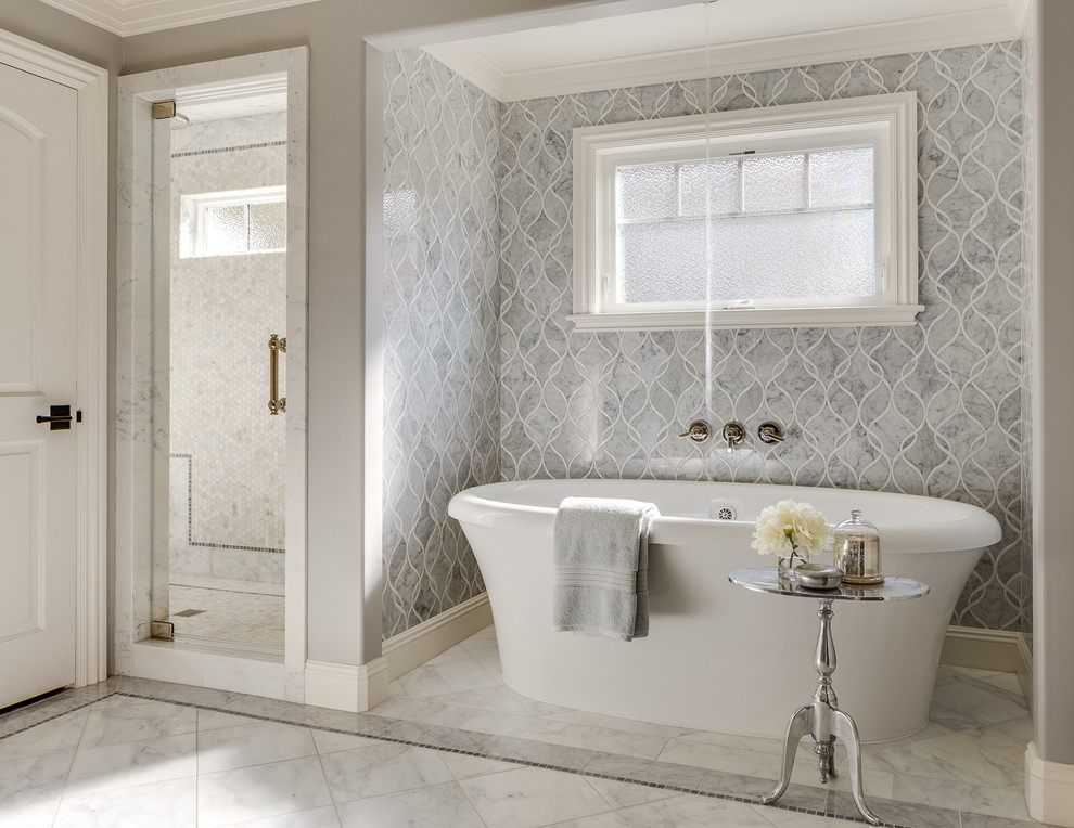 This is an example of a traditional master bathroom in San Francisco with a freestanding tub and a corner shower.