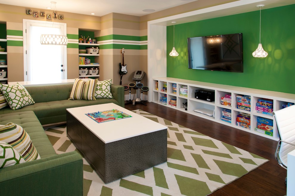 Robeson Design Kids Toy and Playroom Storage Solutions - Trendy gender-neutral dark wood floor playroom photo in San Diego with multicolored walls