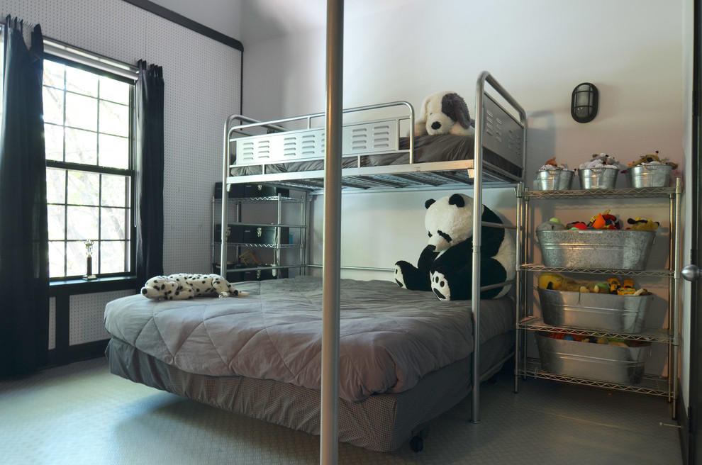 Design ideas for an industrial gender-neutral kids' bedroom for kids 4-10 years old in Dallas with white walls.
