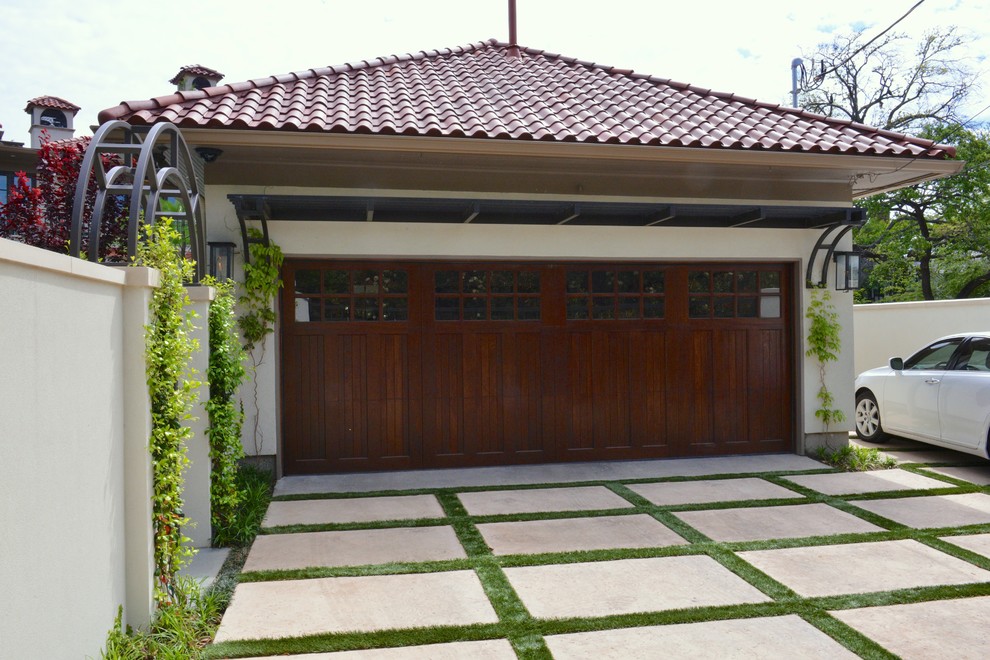 Photo of a mediterranean garage in Dallas.