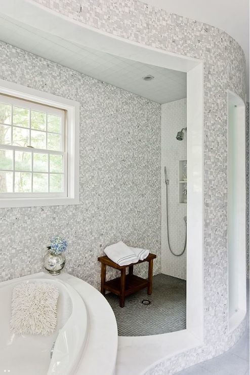 Example of a mid-sized transitional master blue tile and mosaic tile marble floor corner bathtub design in Boston with white cabinets and blue walls