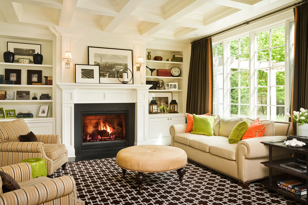 Traditional living room in Seattle with white walls, a standard fireplace and no tv.