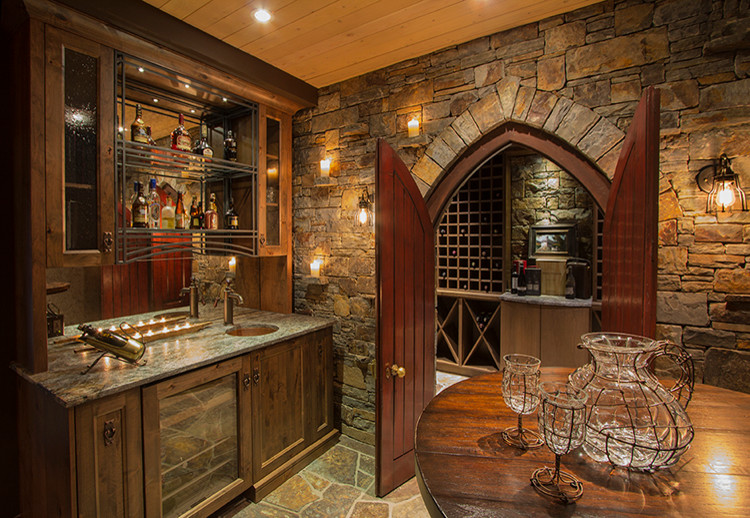 Photo of a small eclectic wine cellar in Calgary.