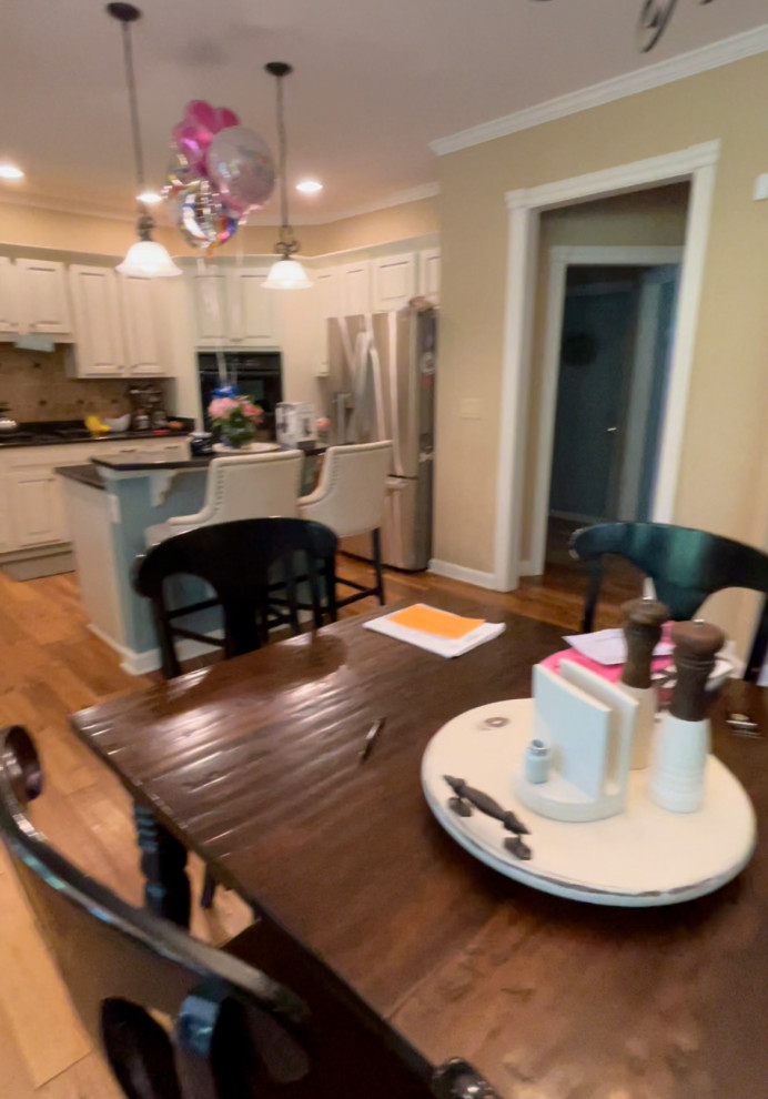 Example of a transitional home design design in Atlanta