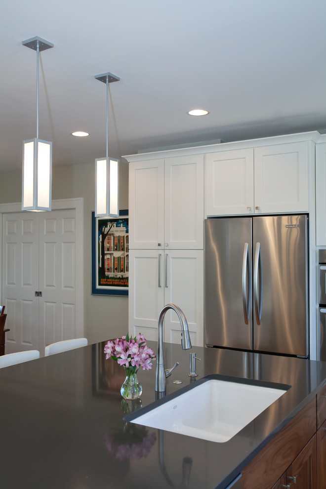 Example of a transitional kitchen design in Denver
