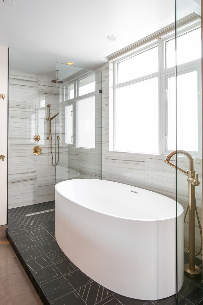 Inspiration for a mid-sized contemporary master bathroom in Vancouver with flat-panel cabinets, light wood cabinets, a freestanding tub, a corner shower, multi-coloured tile, white walls, concrete floors, an undermount sink, quartzite benchtops, grey floor, an open shower and turquoise benchtops.