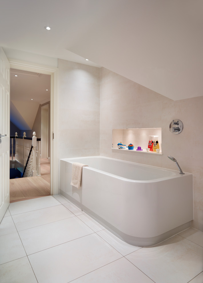 Photo of a large contemporary master bathroom in Surrey with a corner tub, white tile, porcelain tile, white walls and ceramic floors.