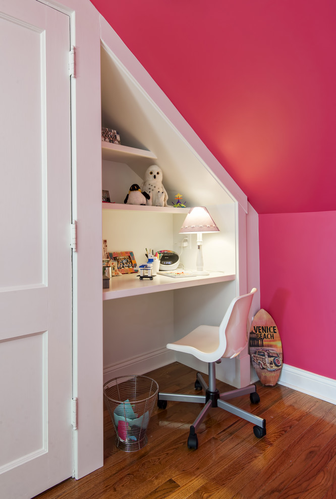 Design ideas for a transitional kids' study room for girls in Louisville with pink walls and medium hardwood floors.