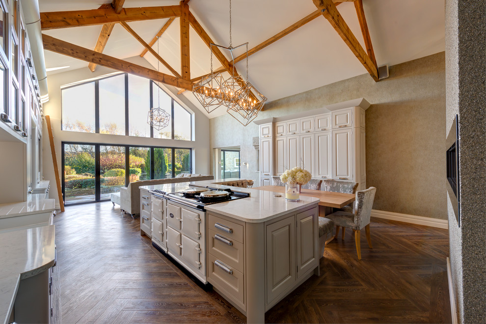 Inspiration for an expansive country eat-in kitchen in Other with raised-panel cabinets, vinyl floors and with island.