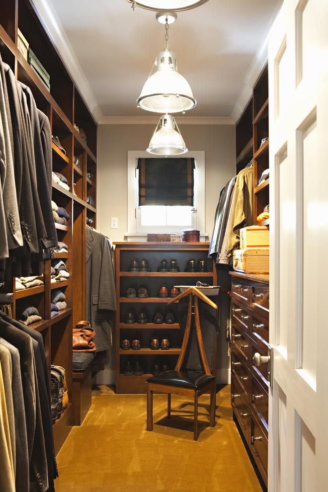 This is an example of a traditional walk-in wardrobe in Los Angeles.