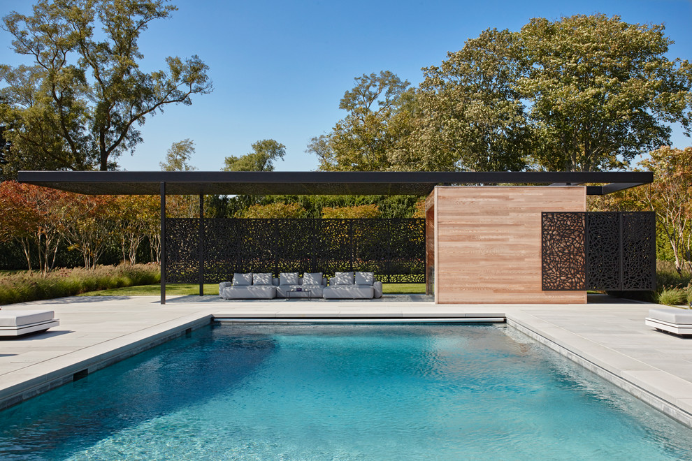 Inspiration for a midcentury pool in New York.