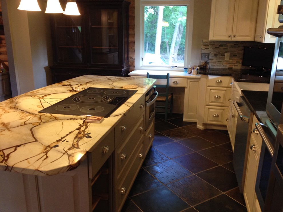 Slate floor kitchen photo with quartzite countertops, green backsplash and stone tile backsplash
