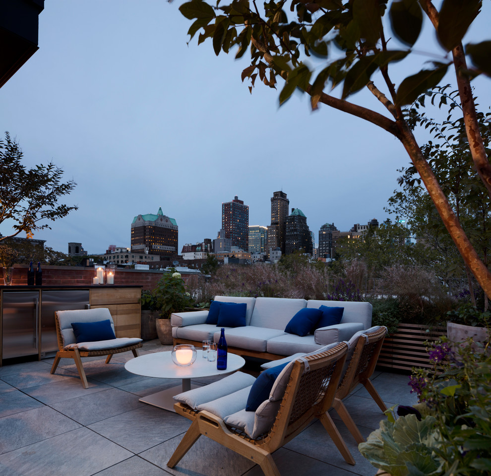 Inspiration for a contemporary backyard patio in New York with no cover.