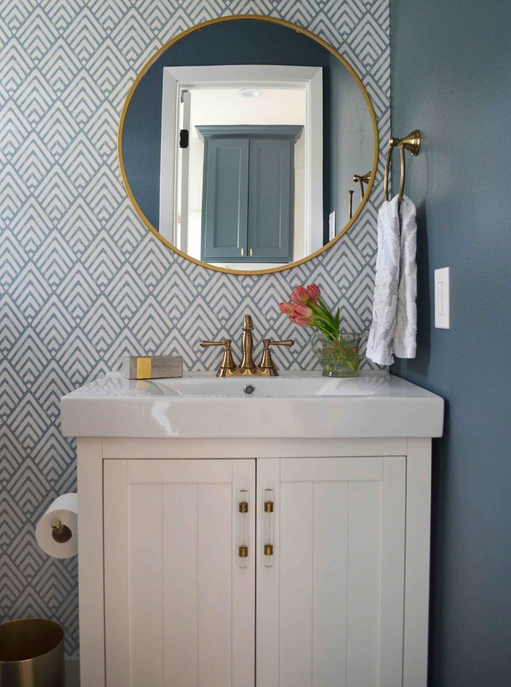 Powder room - transitional powder room idea in Dallas with white cabinets