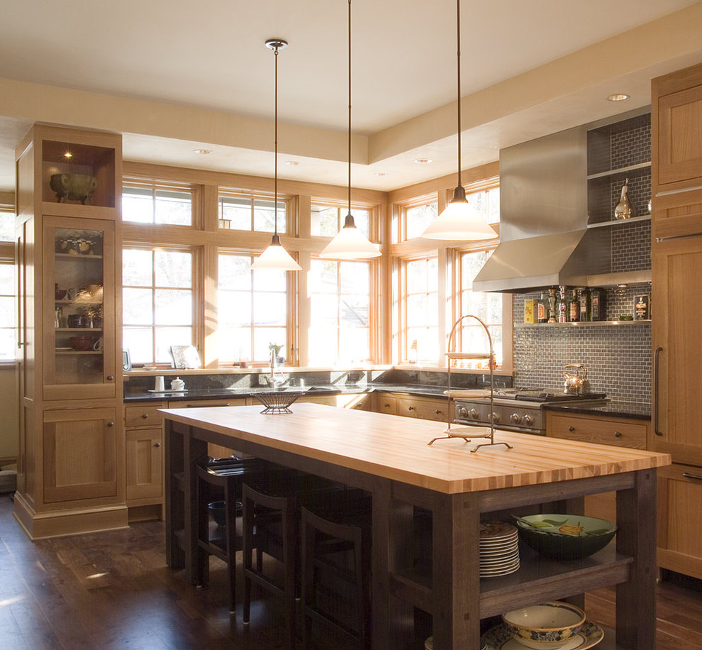 Photo of a contemporary kitchen in Minneapolis with wood benchtops.