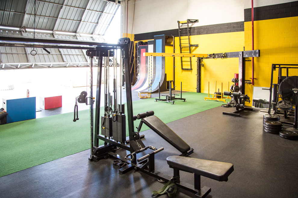Photo of a large contemporary home weight room in Phoenix.