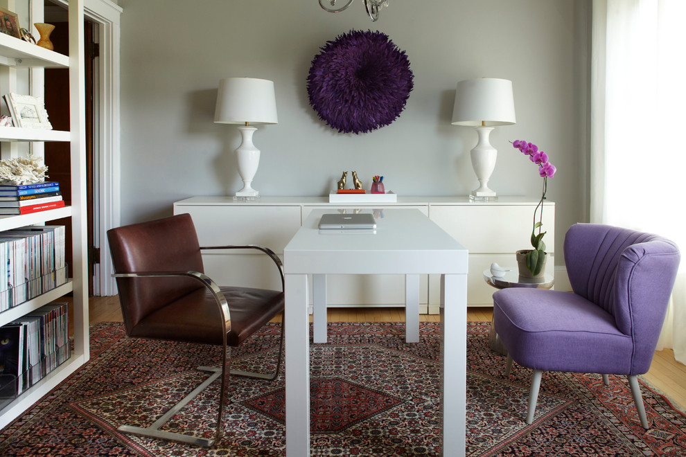 Inspiration for a traditional home office in Boston with grey walls, medium hardwood floors and a freestanding desk.