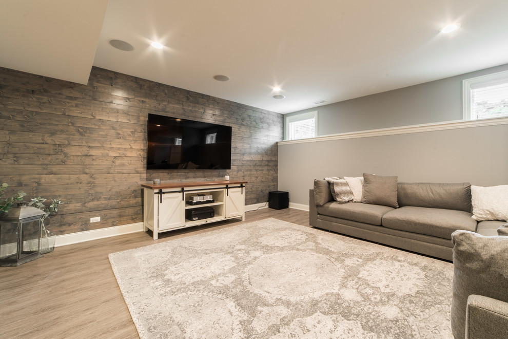 Large transitional carpeted and beige floor basement photo in Chicago with blue walls