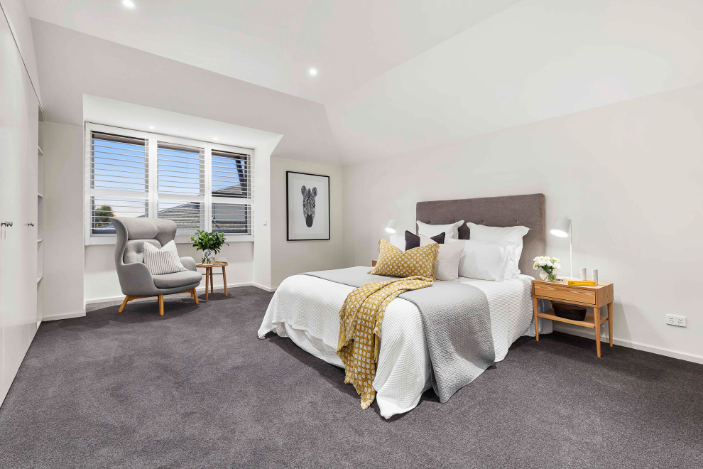 Design ideas for a mid-sized transitional master bedroom in Melbourne with white walls, carpet and grey floor.