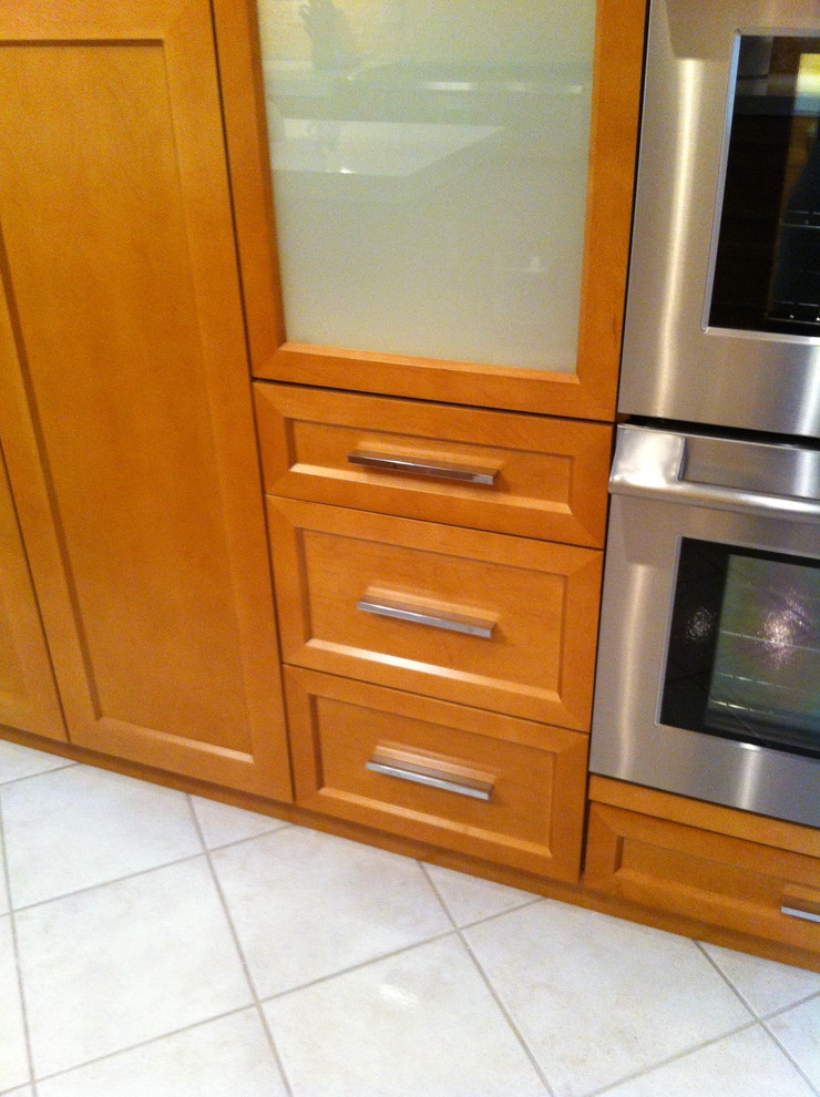 Inspiration for a large transitional u-shaped ceramic tile and beige floor open concept kitchen remodel in Miami with a double-bowl sink, shaker cabinets, quartzite countertops, multicolored backsplash, stone tile backsplash, stainless steel appliances, an island and medium tone wood cabinets