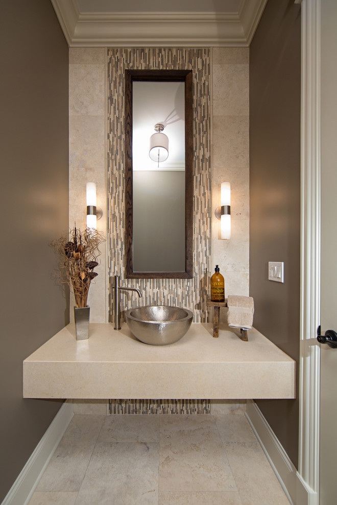 Photo of a small contemporary powder room in Chicago with a vessel sink, multi-coloured tile, matchstick tile, travertine floors, beige walls and beige benchtops.