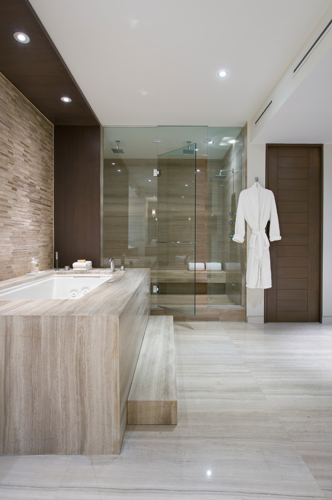 Contemporary bathroom in Miami with an undermount tub, an alcove shower, brown tile and beige floor.