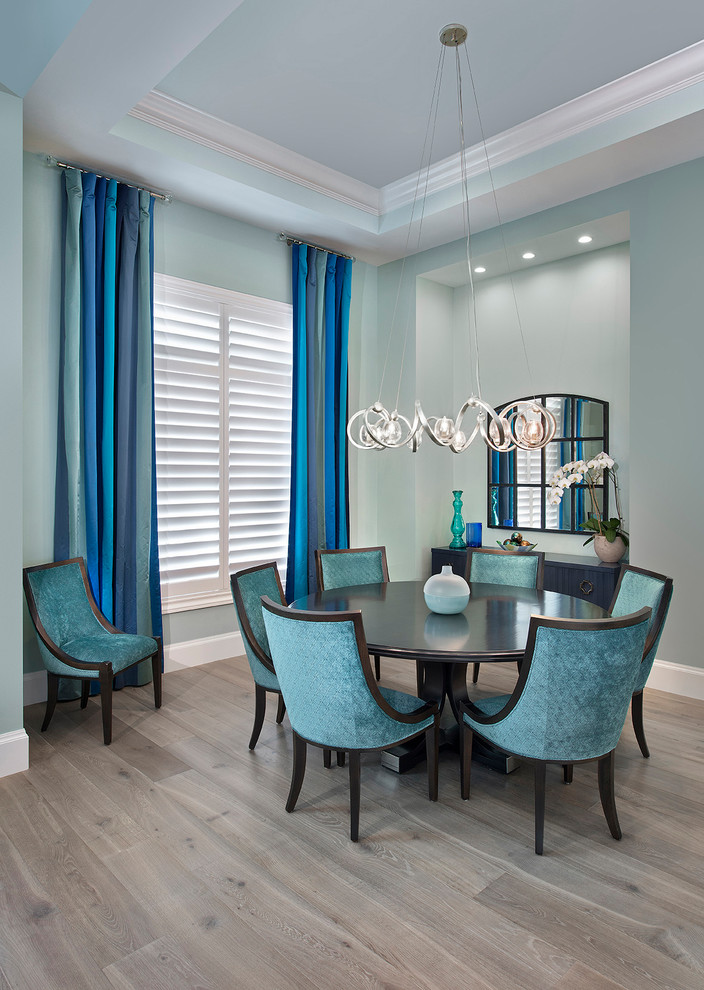 Design ideas for a beach style separate dining room in Miami.