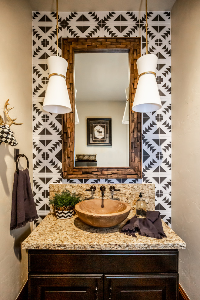 Photo of a country powder room in Salt Lake City with raised-panel cabinets, dark wood cabinets, black and white tile, beige walls, a vessel sink, brown benchtops and a freestanding vanity.