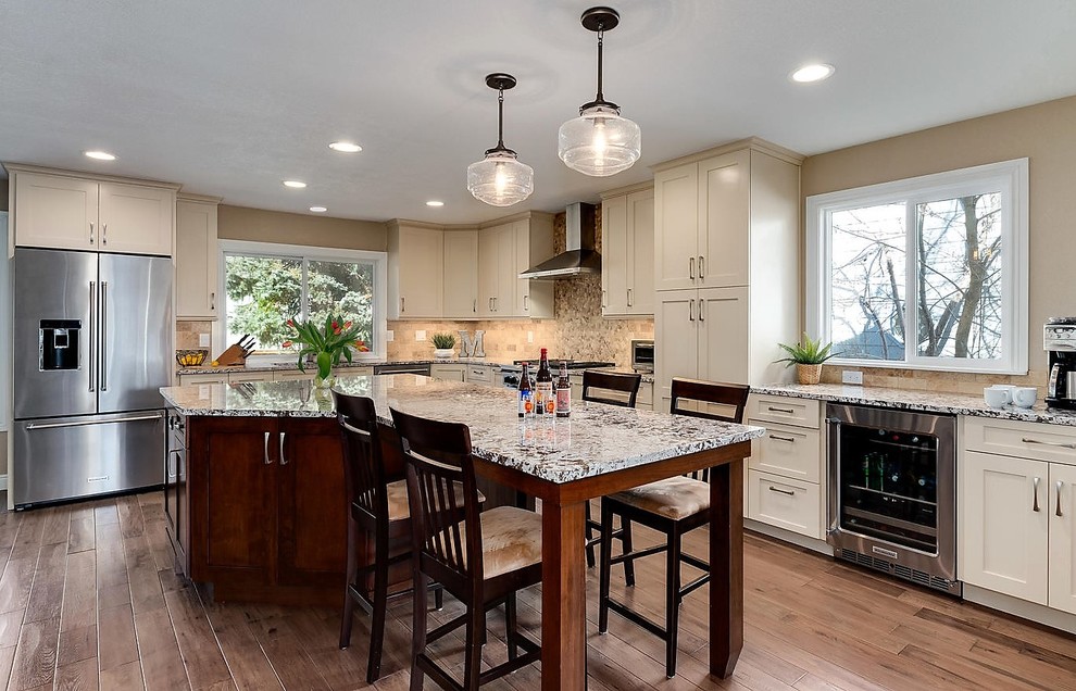 Example of a transitional kitchen design in Denver