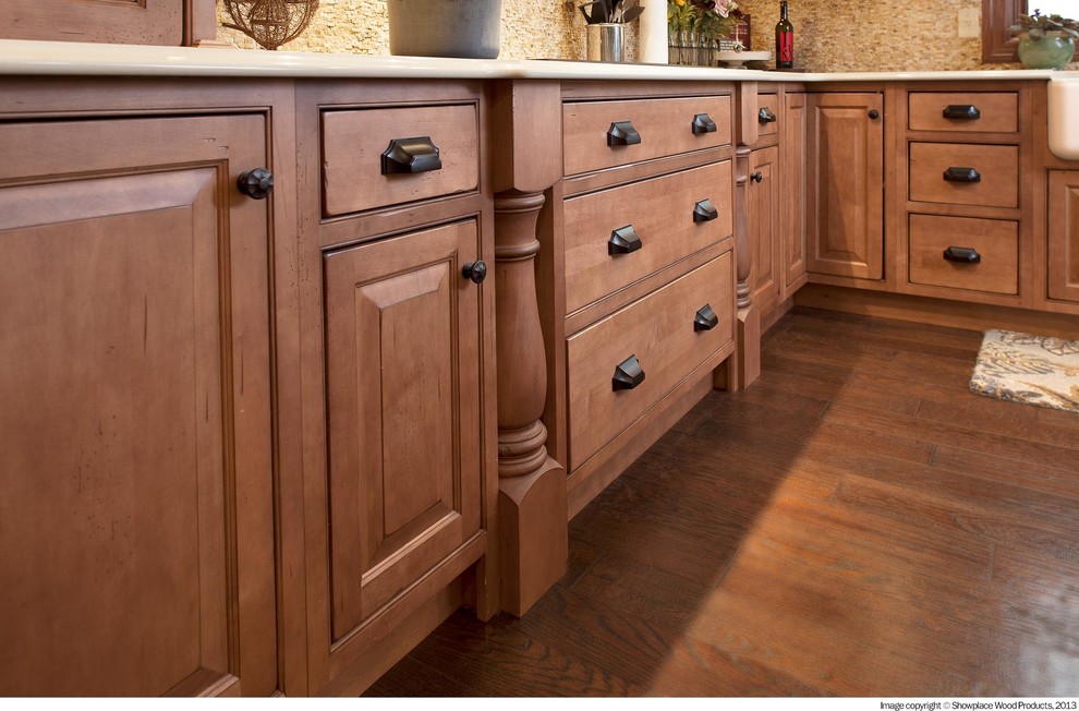 Inspiration for a country kitchen in Other with a farmhouse sink, raised-panel cabinets, light wood cabinets, soapstone benchtops, multi-coloured splashback, mosaic tile splashback, stainless steel appliances, medium hardwood floors, with island and brown floor.