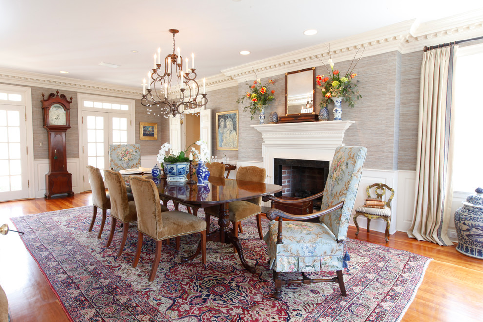 Design ideas for a traditional dining room in Philadelphia with grey walls and a standard fireplace.