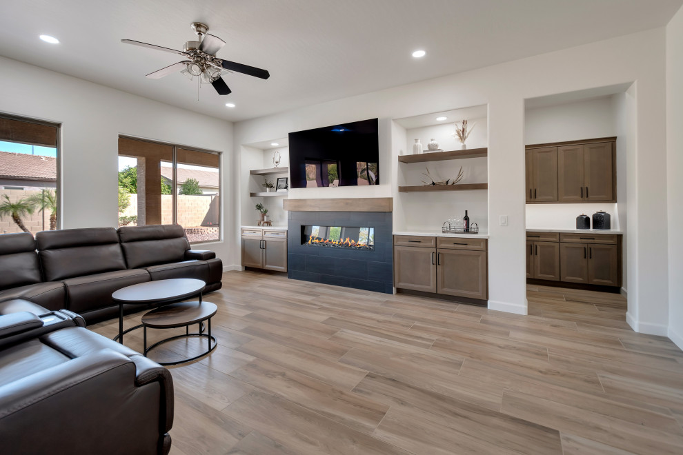 Eat-in kitchen - mid-sized transitional u-shaped ceramic tile and brown floor eat-in kitchen idea in Phoenix with beaded inset cabinets, brown cabinets, quartzite countertops, white backsplash, ceramic backsplash, an island and white countertops