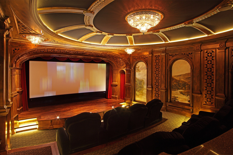 Mediterranean enclosed home theatre in Minneapolis with brown walls, carpet, green floor and a projector screen.
