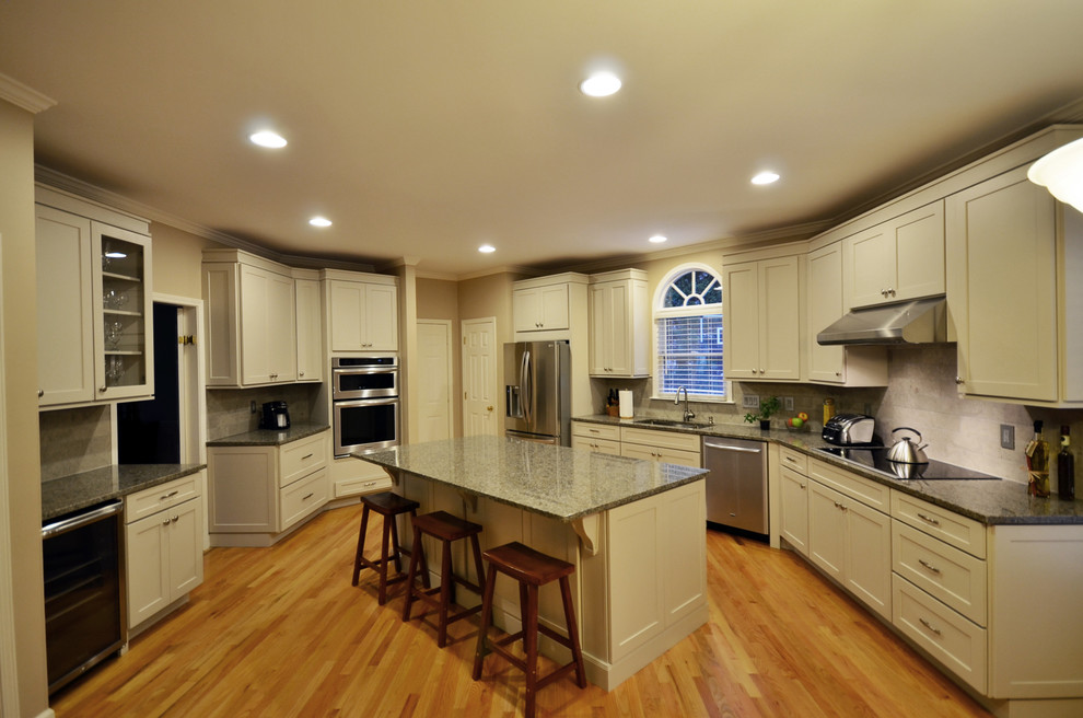 Design ideas for a traditional kitchen in Charlotte with shaker cabinets and grey cabinets.
